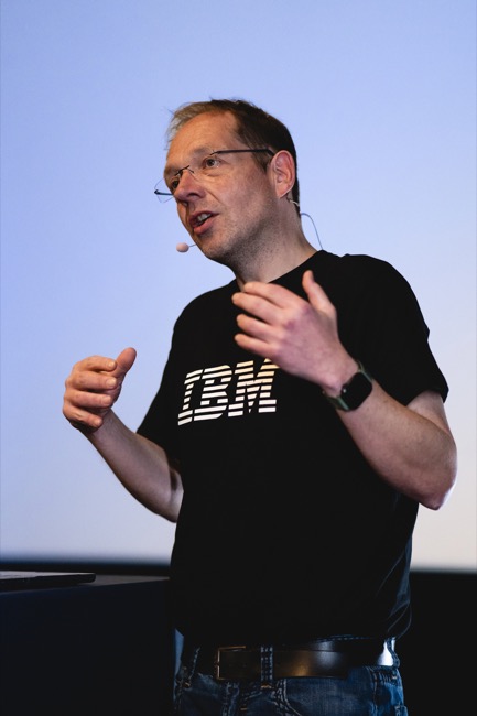 Markus speaking on stage